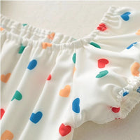 Костим за капење со срциња и капа