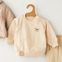 Комплет блуза, панталони и карирана јакна