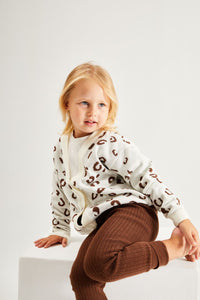 2 Делен комплет плетен џемпер и хеланки