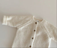 Плетен џемпер со копчиња