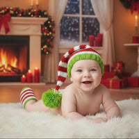 Новогодишен плетен сет за бебе – капа со помпон и чорапчиња