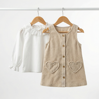 Корд фустан со срце џебови и бела блуза