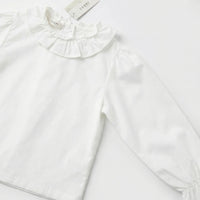 Корд фустан со срце џебови и бела блуза