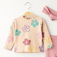 Комплет блуза со цветови и траперки со трака за коса