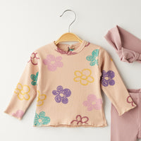 Комплет блуза со цветови и траперки со трака за коса