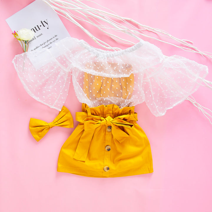 Комплет Жолта Сукња со Петличиња и Бела Проѕирна Блуза + Панделка