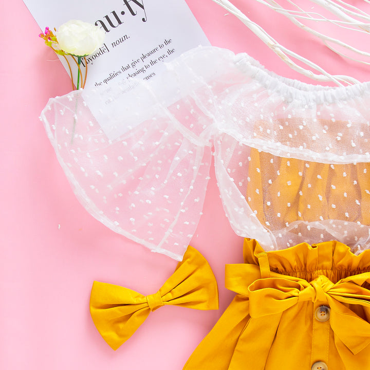 Комплет Жолта Сукња со Петличиња и Бела Проѕирна Блуза + Панделка